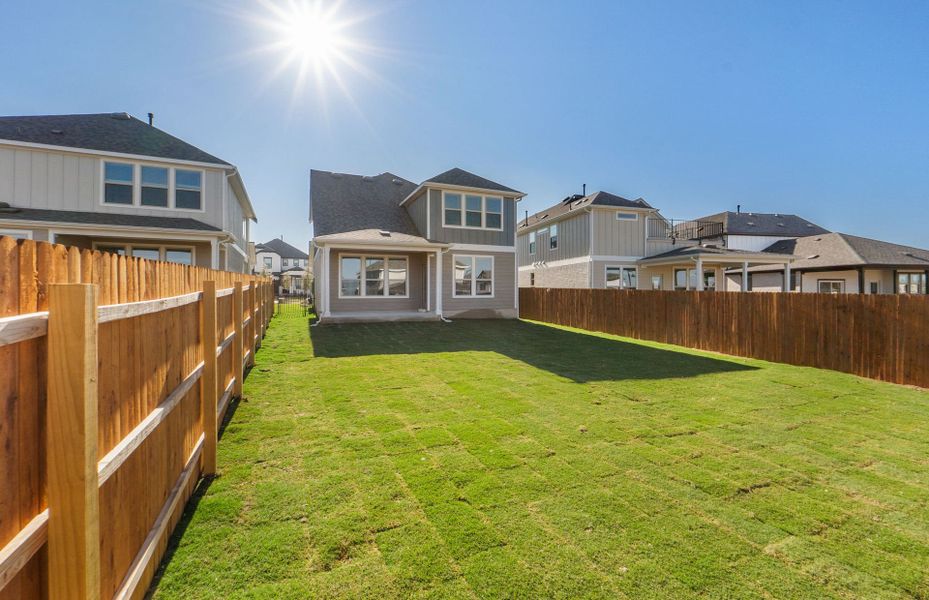 Exterior details and patio area of a home in Santa Rita Ranch, Liberty Hill (Image 29).