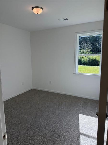 Spacious, unfurnished interior of a new home in The Brooke at Rivertown, South Fulton (Image 12).