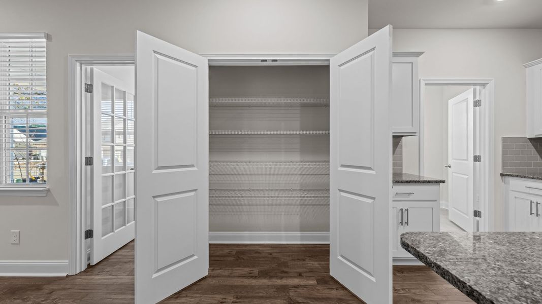Furnished interior view inside a new home in Tyler - Home on the Lake, New Bern (Image 9).