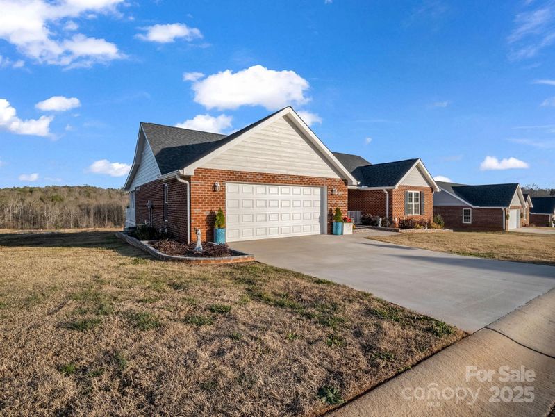 Front exterior of a new home in , Spindale, NC, highlighting curb appeal (Image 1). Front exterior of a new home in , Spindale, NC, highlighting curb appeal (Image 1).