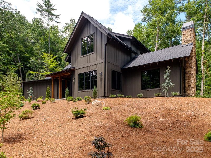 Front exterior of a new home in , Brevard, NC, highlighting curb appeal (Image 28).