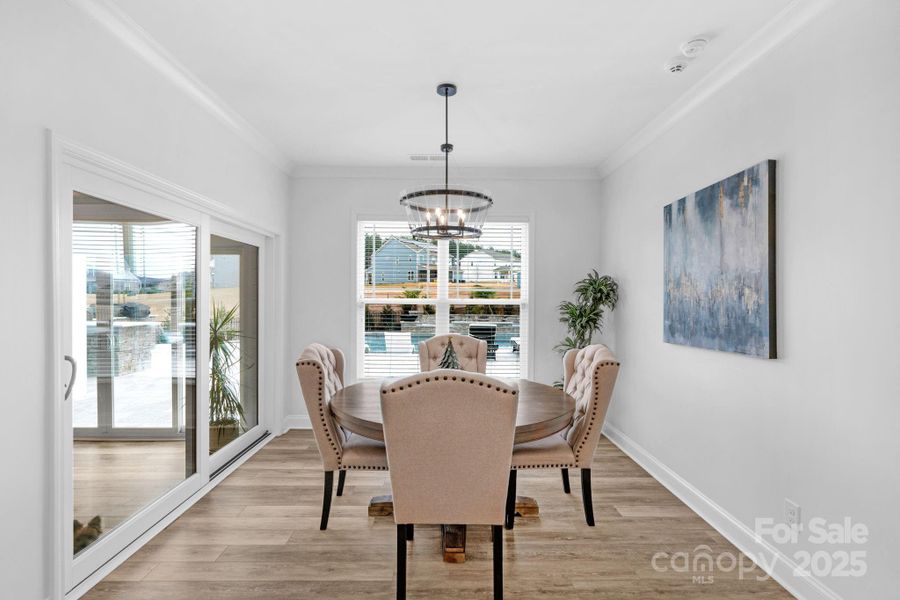 Breakfast nook with access to the climate-controlled sunroom