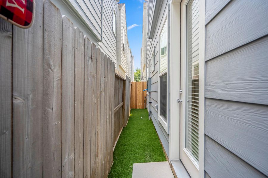 Exterior details and patio area of a home in , Houston (Image 4).