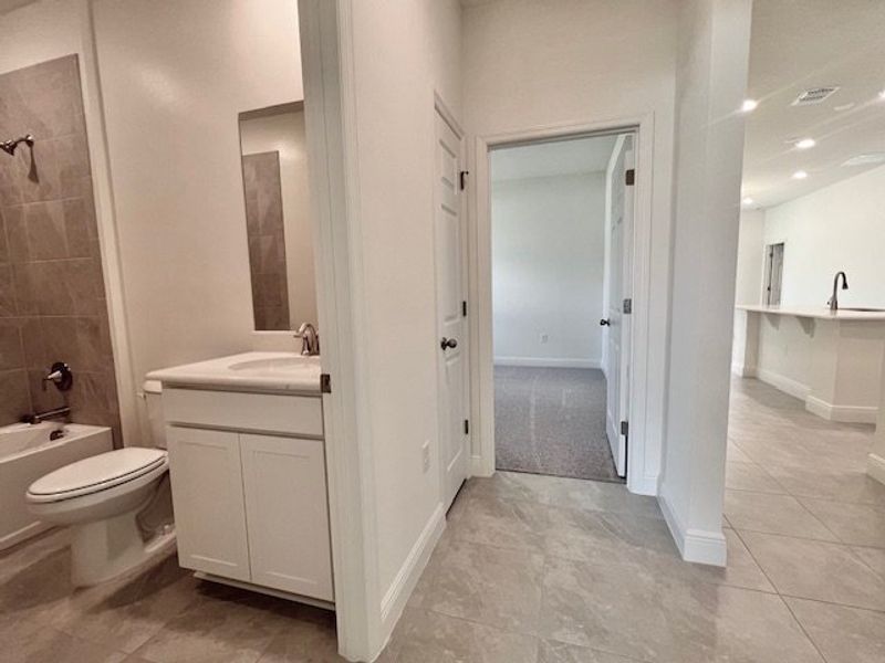 Furnished interior view inside a new home in Lakes At St Sebastian, Micco (Image 6).