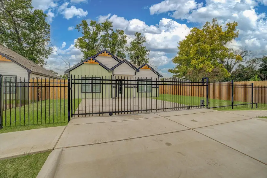 Private gate and double wide driveway for your convenience. Private gate and double wide driveway for your convenience.