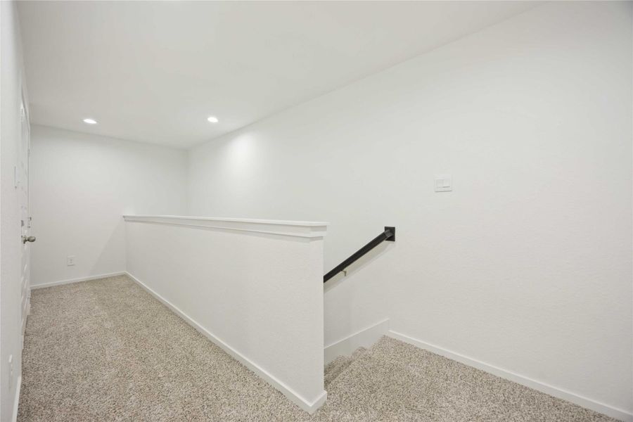 Spacious, unfurnished interior of a new home in Alaia Crossing, Houston (Image 21).