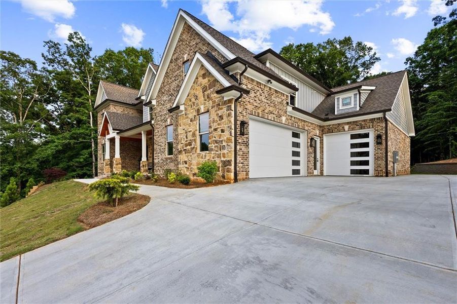 Front exterior of a new home in , Gainesville, GA, highlighting curb appeal (Image 27).