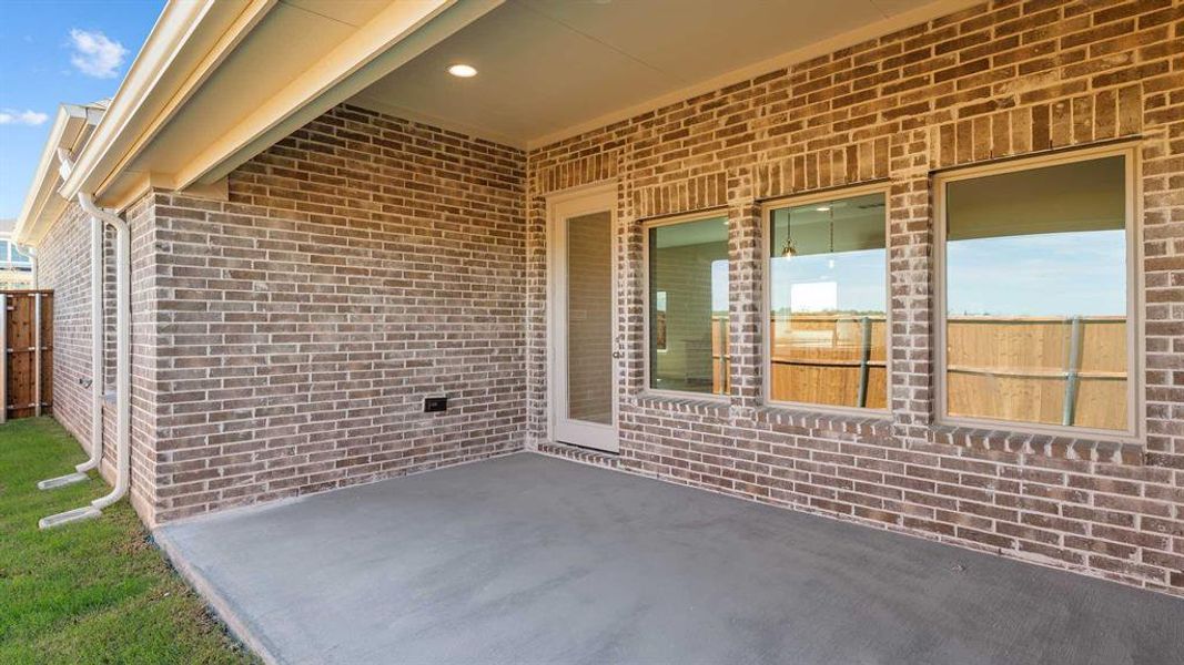 Exterior details and patio area of a home in The Heights At Uptown Celina 45', Celina (Image 2). Exterior details and patio area of a home in The Heights At Uptown Celina 45', Celina (Image 2).