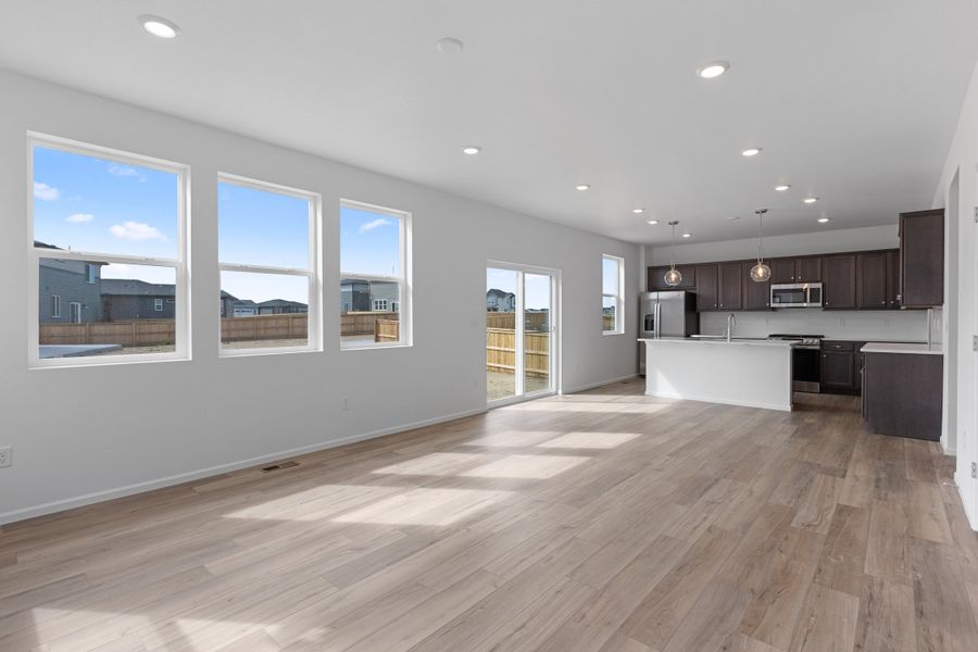 Spacious, unfurnished interior of a new home in The Cottages Collection at Ridgeline Vista, Brighton (Image 13).