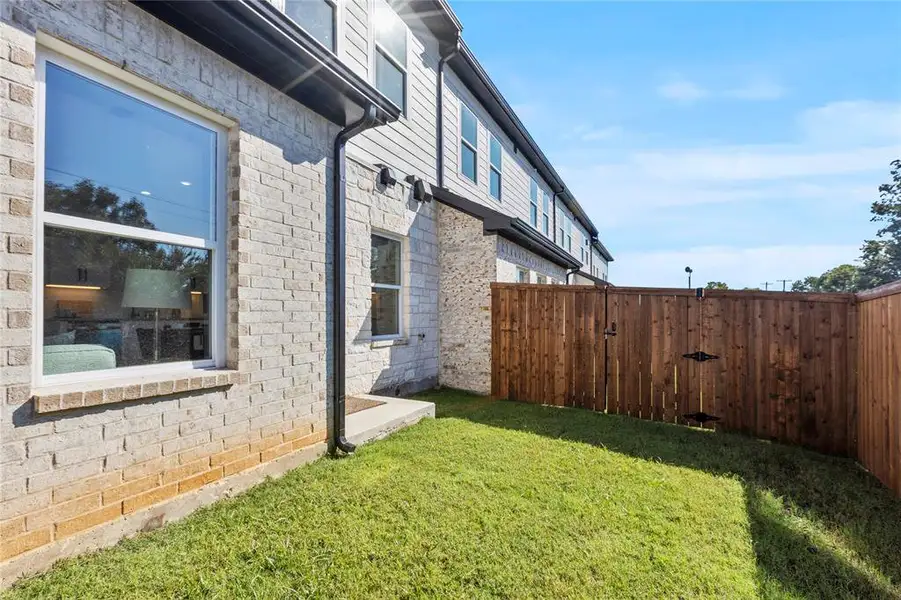 Exterior details and patio area of a home in , Grand Prairie (Image 4).