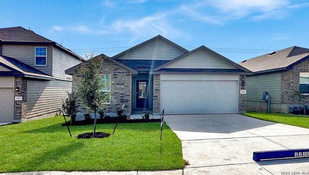 Front exterior of a new home in The Canyons at Amhurst, San Antonio, TX, highlighting curb appeal (Image 2). Front exterior of a new home in The Canyons at Amhurst, San Antonio, TX, highlighting curb appeal (Image 2).