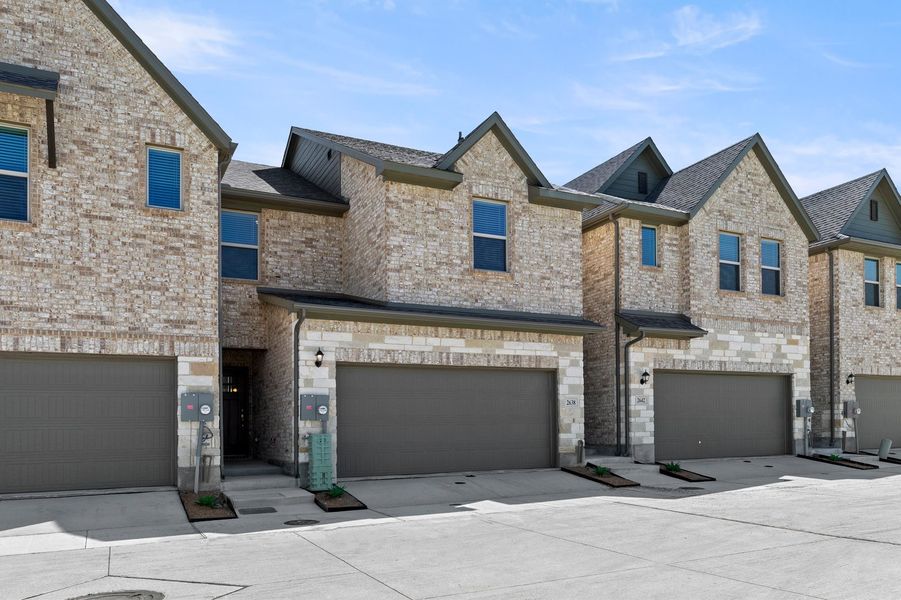 Front exterior of a new home in Sereno Oaks, Dallas, TX, highlighting curb appeal (Image 2). Front exterior of a new home in Sereno Oaks, Dallas, TX, highlighting curb appeal (Image 2).