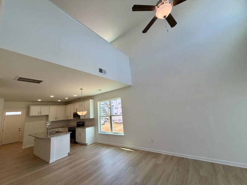 Spacious, unfurnished interior of a new home in Bellevue Townhomes, Greenville (Image 11).
