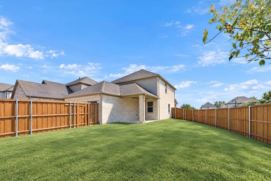 Exterior details and patio area of a home in Cross Creek Meadows, Celina (Image 20).
