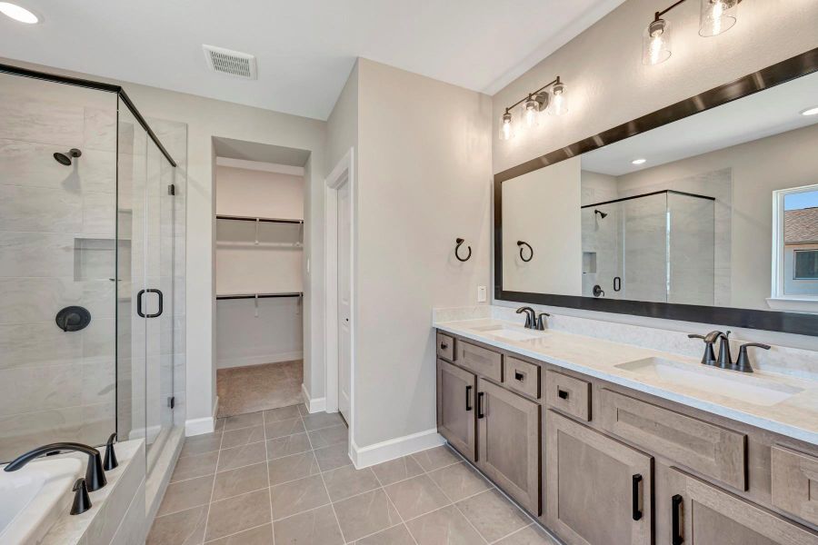 Furnished interior view inside a new home in COLTON - Reserve Collection, Todd Mission (Image 9).