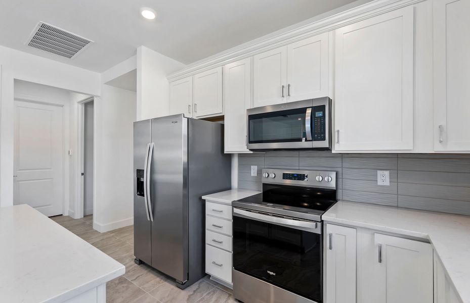 Furnished interior view inside a new home in Legacy Groves, Nokomis (Image 9).