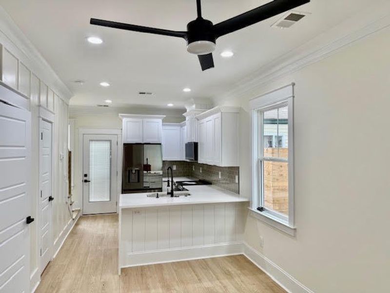 Furnished interior view inside a new home in , North Charleston (Image 6).