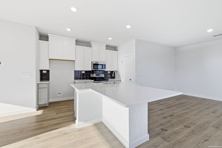 Furnished interior view inside a new home in , New Braunfels (Image 14).