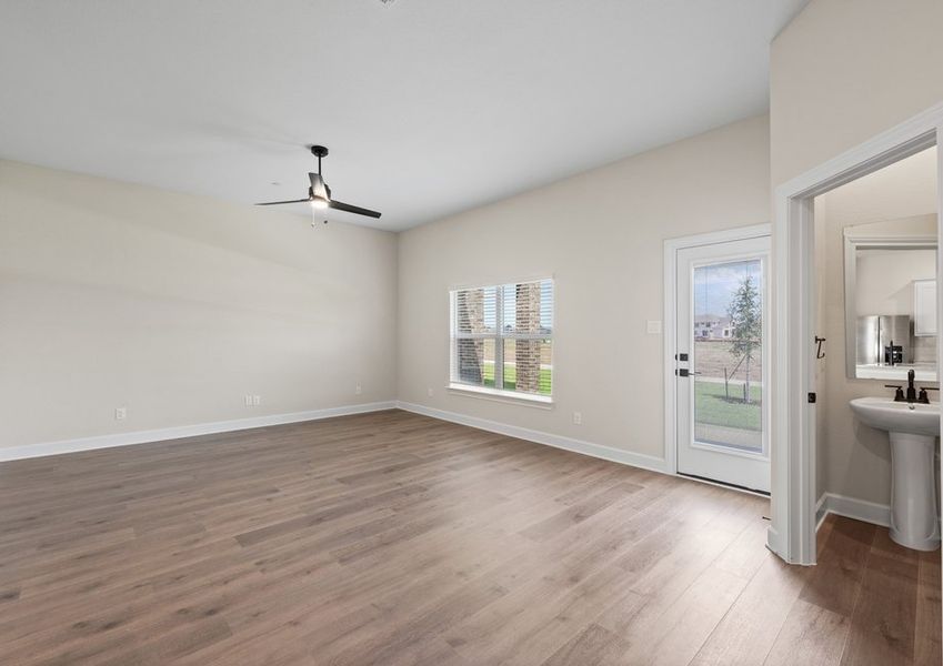 The family room has a large window that lets in great, natural light.