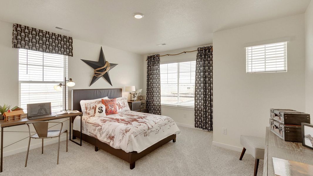 Representative furnished interior of a home built from the Holcombe by D.R. Horton in Settlers Crossing, Commerce City (Image 18).