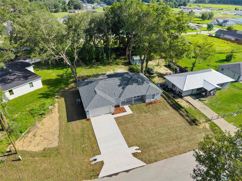 Front exterior of a new home in , Ocala, FL, highlighting curb appeal (Image 2). Front exterior of a new home in , Ocala, FL, highlighting curb appeal (Image 2).