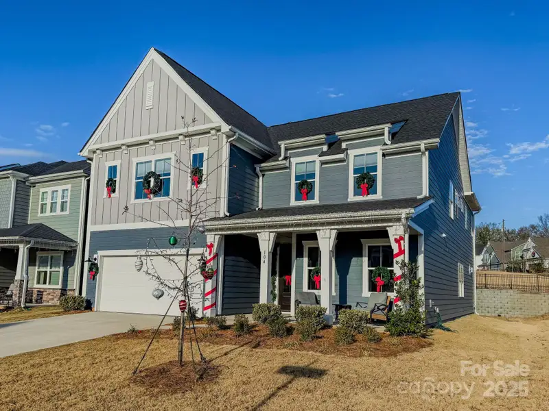 Front exterior of a new home in , Mooresville, NC, highlighting curb appeal (Image 1). Front exterior of a new home in , Mooresville, NC, highlighting curb appeal (Image 1).