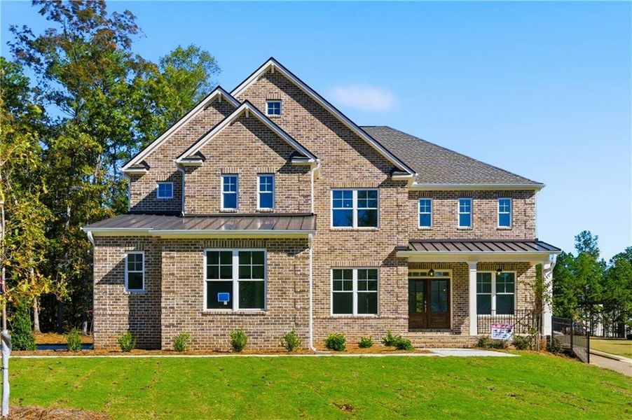 Front exterior of a new home in The Estates at Hurricane Pointe, Douglasville, GA, highlighting curb appeal (Image 26).
