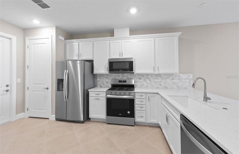 Furnished interior view inside a new home in BeachWalk by Manasota Key, Englewood (Image 10).