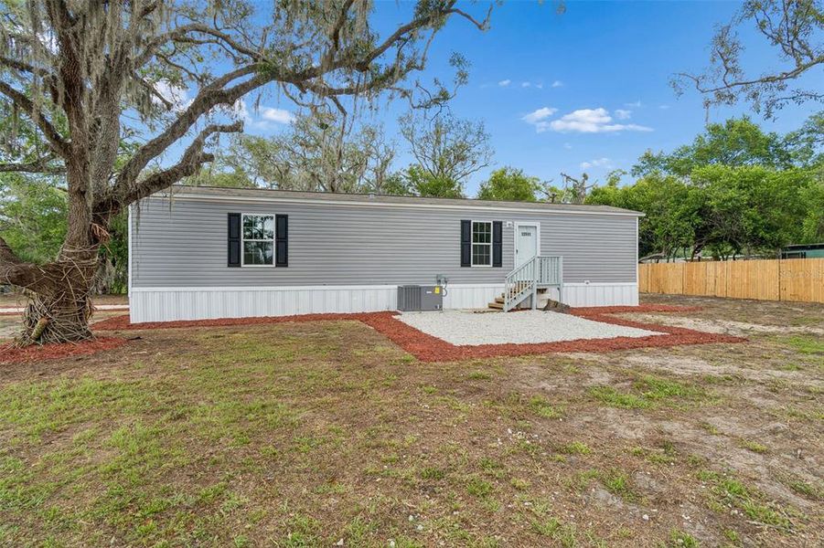 Exterior details and patio area of a home in , New Port Richey (Image 23).