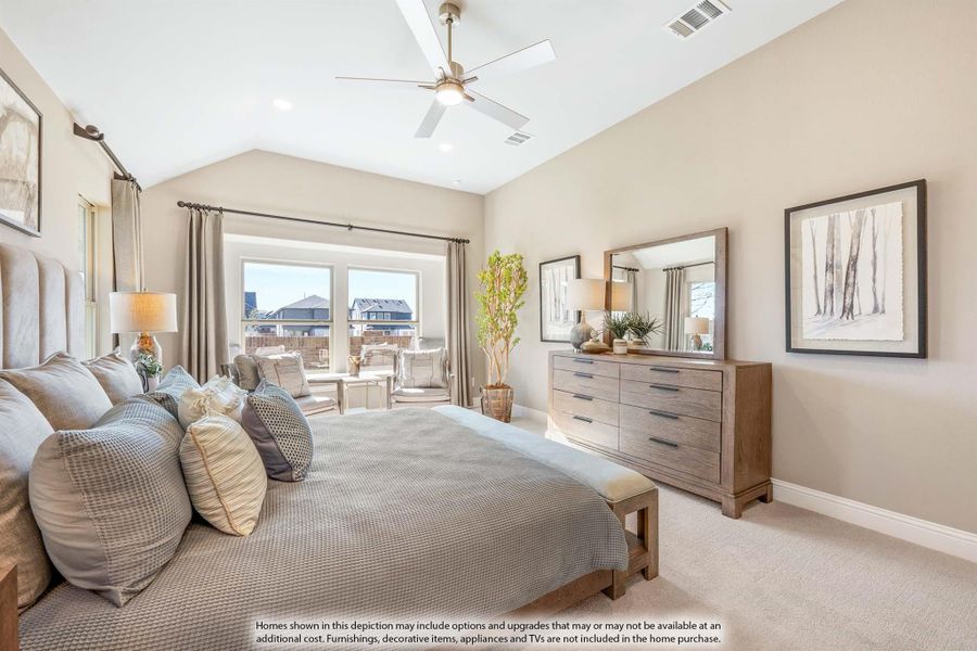 Master bedroom with vaulted ceiling, ceiling fan, wood dresser, and large windows with sitting area Master bedroom with vaulted ceiling, ceiling fan, wood dresser, and large windows with sitting area