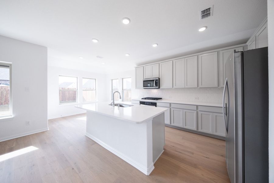 Furnished interior view inside a new home in Verandah, Royse City (Image 7).