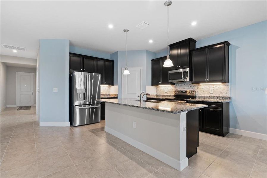 Furnished interior view inside a new home in , Port Charlotte (Image 16).