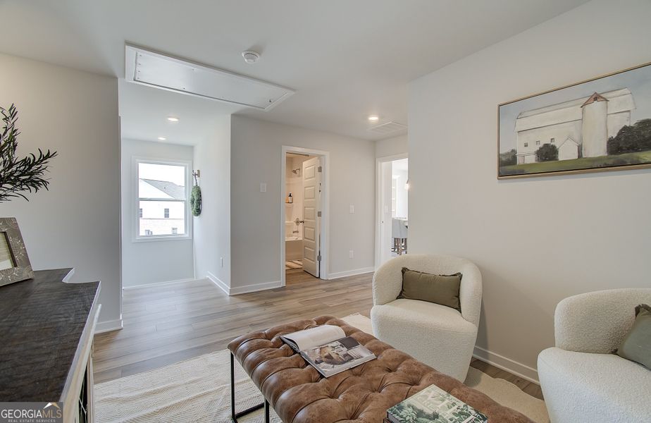 Furnished interior view inside a new home in The Towns at Auburn Station West, Auburn (Image 16).