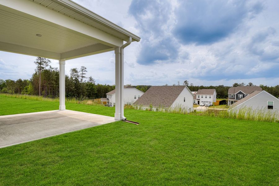 Exterior details and patio area of a home in The Beacon at Old Peachtree Single Family Homes, Lawrenceville (Image 66).