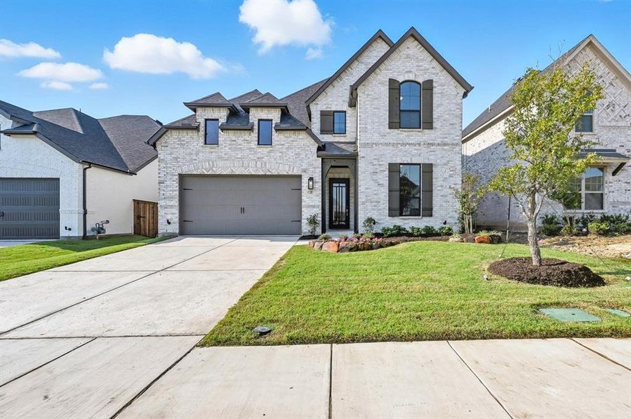 Exterior details and patio area of a home in Trinity Falls, McKinney (Image 1). Exterior details and patio area of a home in Trinity Falls, McKinney (Image 1).