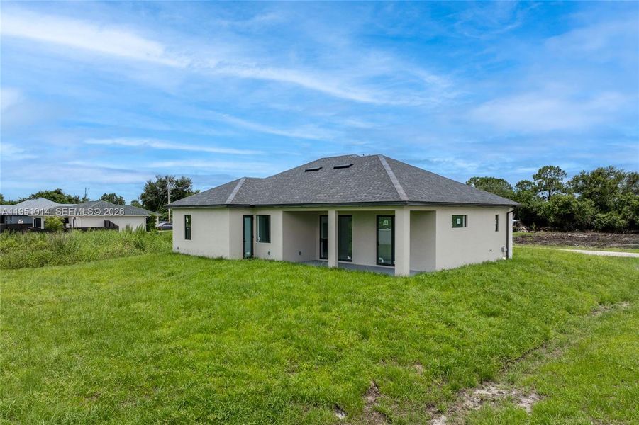 Exterior details and patio area of a home in , Lehigh Acres (Image 26).