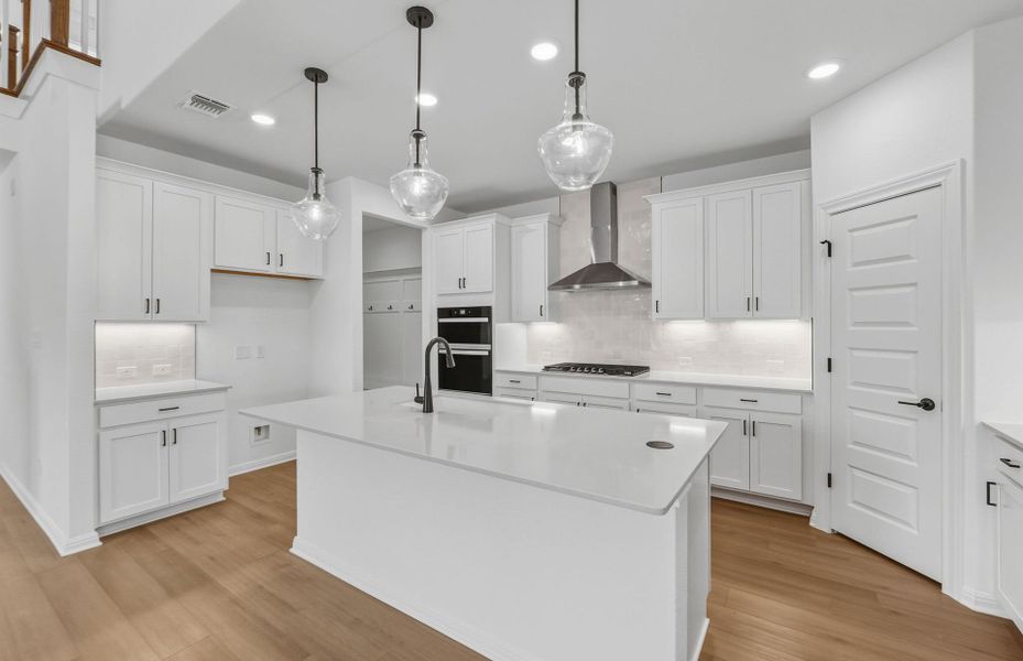 Furnished interior view inside a new home in Bluffview Reserve, Leander (Image 7).