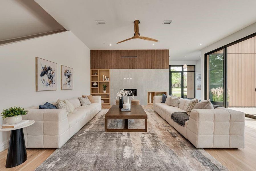 Custom built-ins and walnut mini fluted wood accents add depth, texture, and refined character.