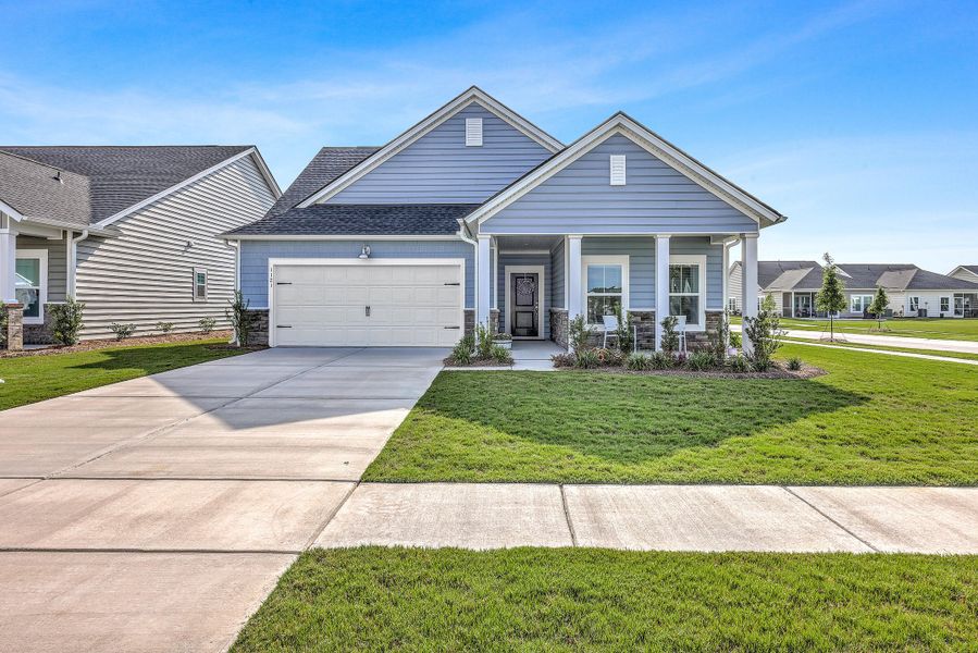 Front exterior of a new home in , Summerville, SC, highlighting curb appeal (Image 21).