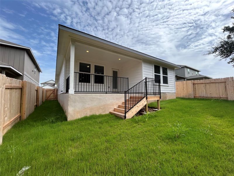 Back of property with a fenced backyard Back of property with a fenced backyard