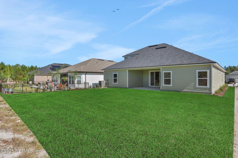 Exterior details and patio area of a home in Hyland Trail, Green Cove Springs (Image 22).
