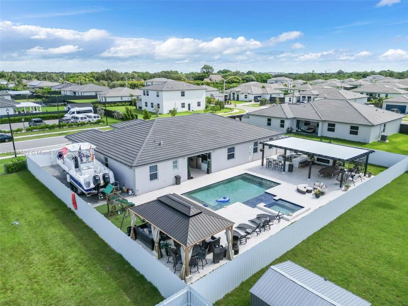 Front exterior of a new home in , Homestead, FL, highlighting curb appeal (Image 23). Front exterior of a new home in , Homestead, FL, highlighting curb appeal (Image 23).