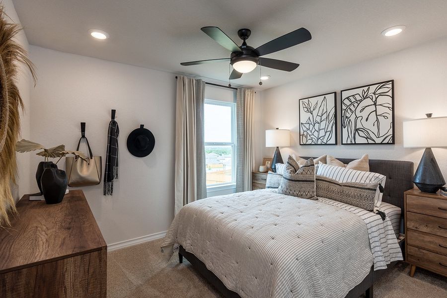 Representative furnished interior of a home built from the Rhapsody 2 by Taylor Morrison in Longview 40s, Del Valle (Image 40).