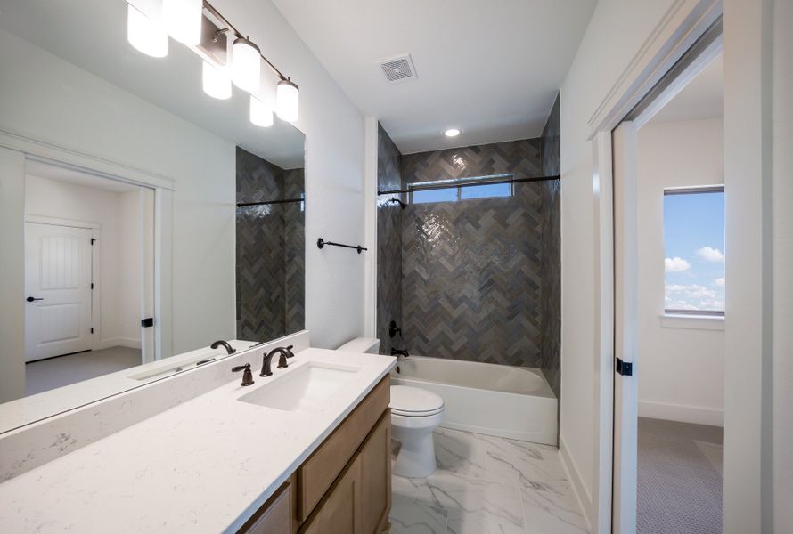 Representative furnished interior of a home built from the The Travis by Whitestone Custom Homes in Johnson Ranch, Bulverde (Image 21).