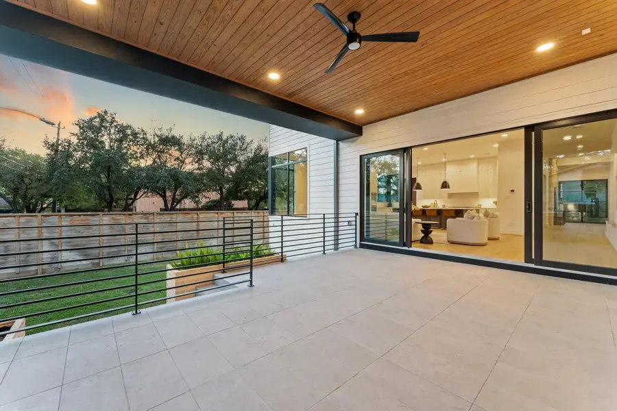 Exterior details and patio area of a home in , Houston (Image 3).