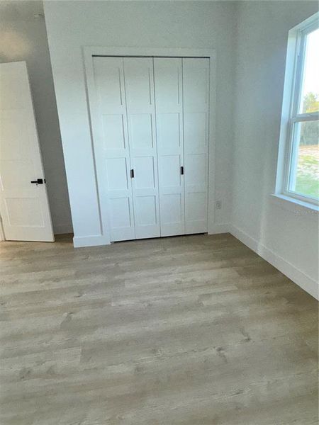 Spacious, unfurnished interior of a new home in , Frostproof (Image 27).