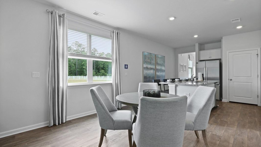 Furnished interior view inside a new home in Pine Hills at Cane Bay, Summerville (Image 36). Furnished interior view inside a new home in Pine Hills at Cane Bay, Summerville (Image 36).