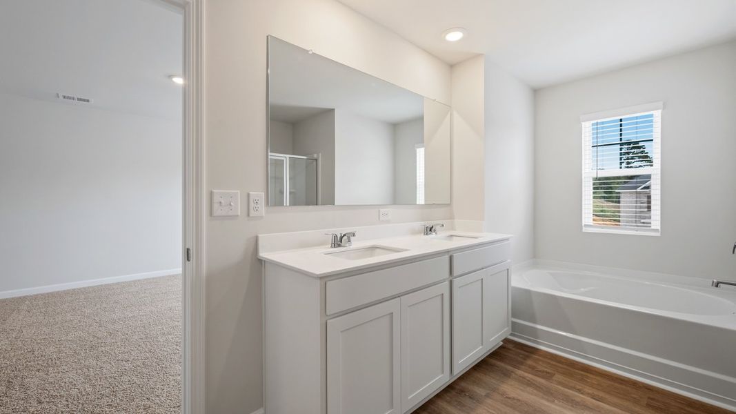 Furnished interior view inside a new home in The Preserve at Agricultural Village, Perry (Image 9).