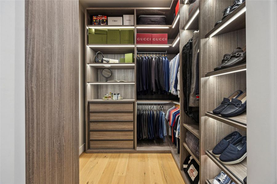 Custom primary closet by Molteni & C, by BeDesign.