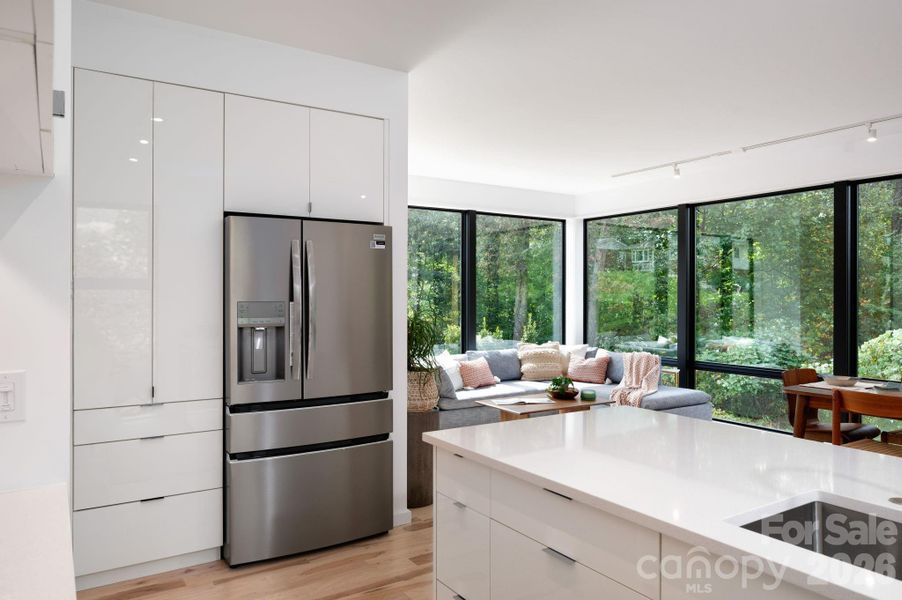 Enjoy Wooded Views Throughout Main Floor